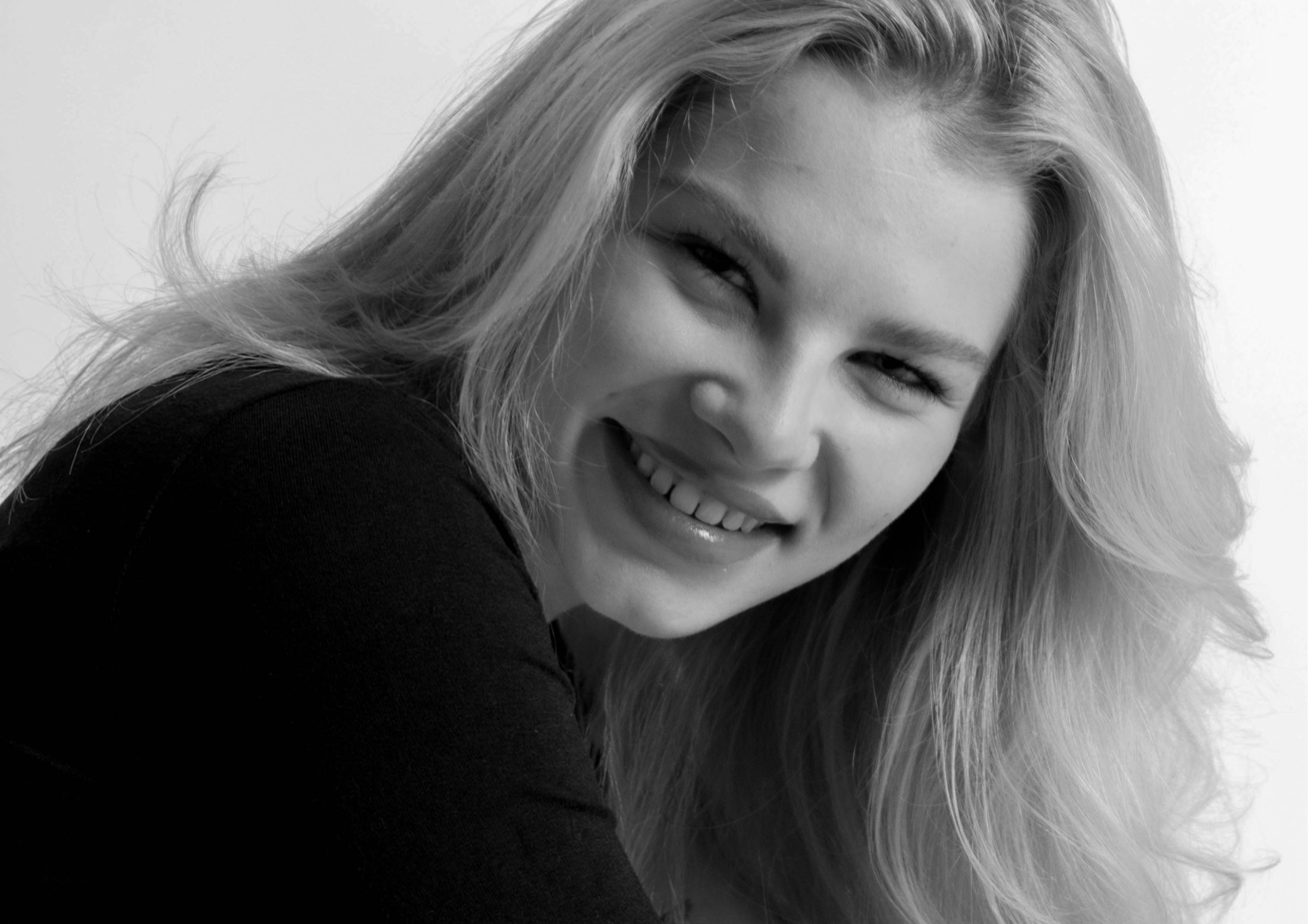 Black and white smiling portrait of Maren Hoff